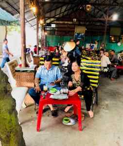 Pause café sur le marché de Can Tho - Vietnam