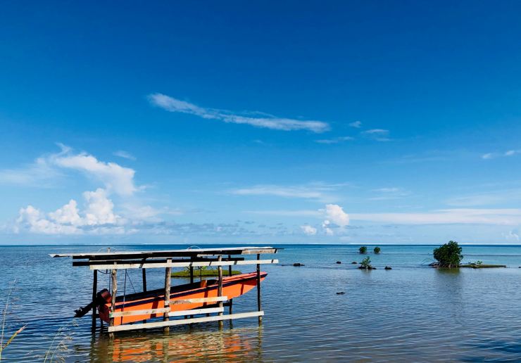 Bâteau, motu et lagon - Raiatea - Polynésie